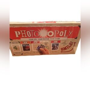 PHOTOPOLY BOX UNOPENED NEVER PLAYED NEW. From Dillard’s.